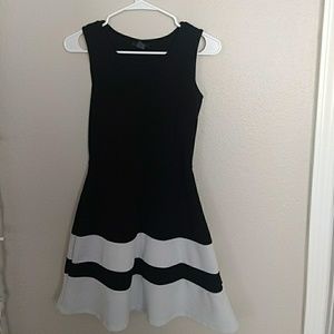 Adorable, classy black and white striped dress